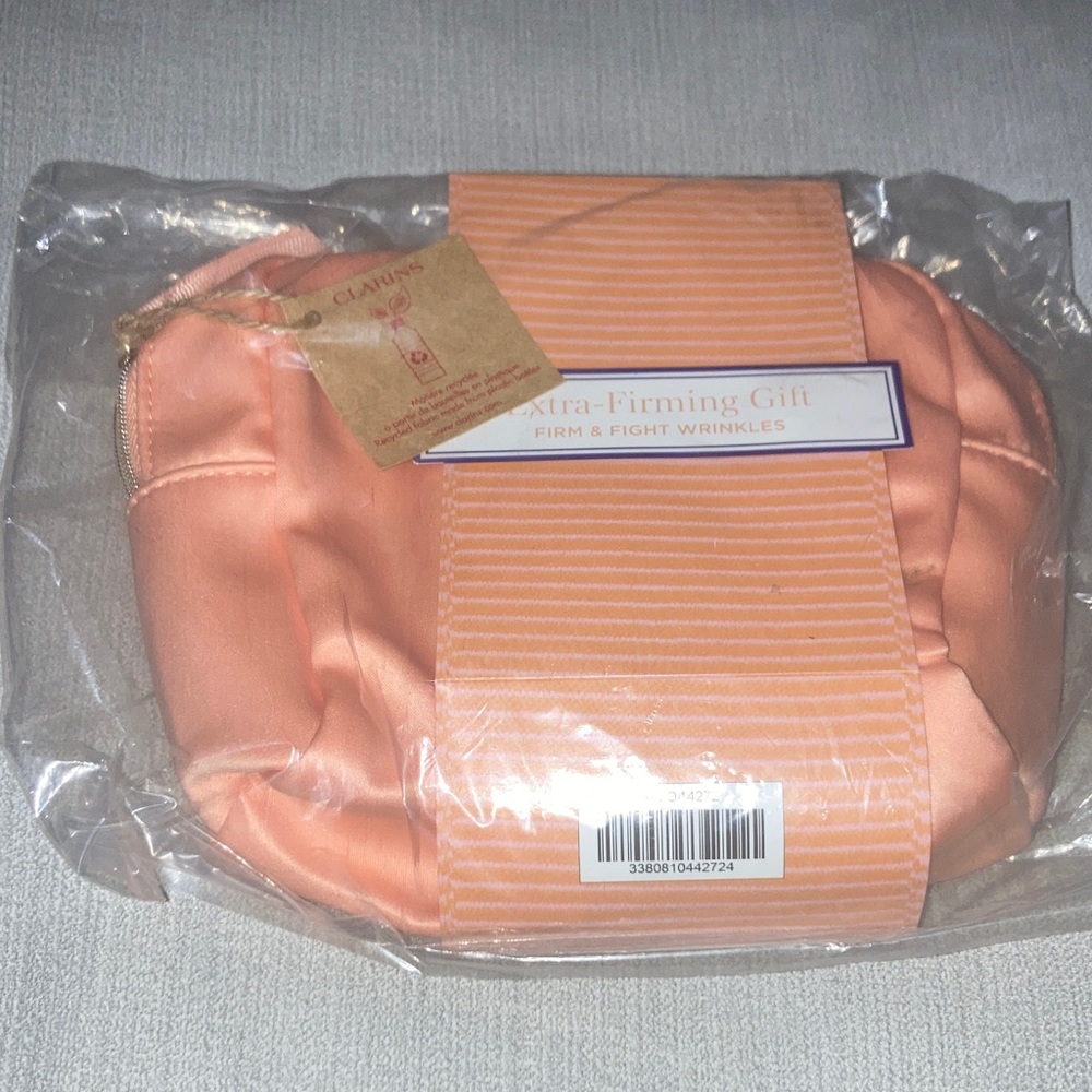 Clarins Extra Firming Gift Apricot Beauty Pouch.